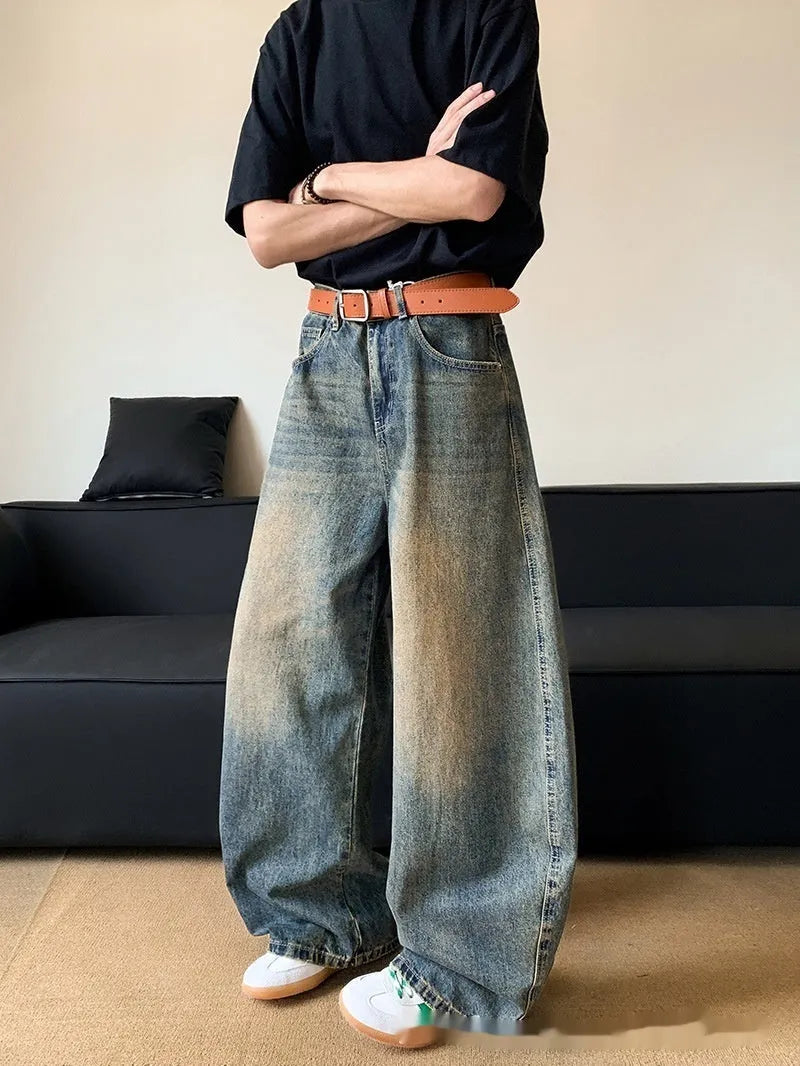 Men's retro blue distressed denim jeans with wide-leg cut and micro elasticity fabric