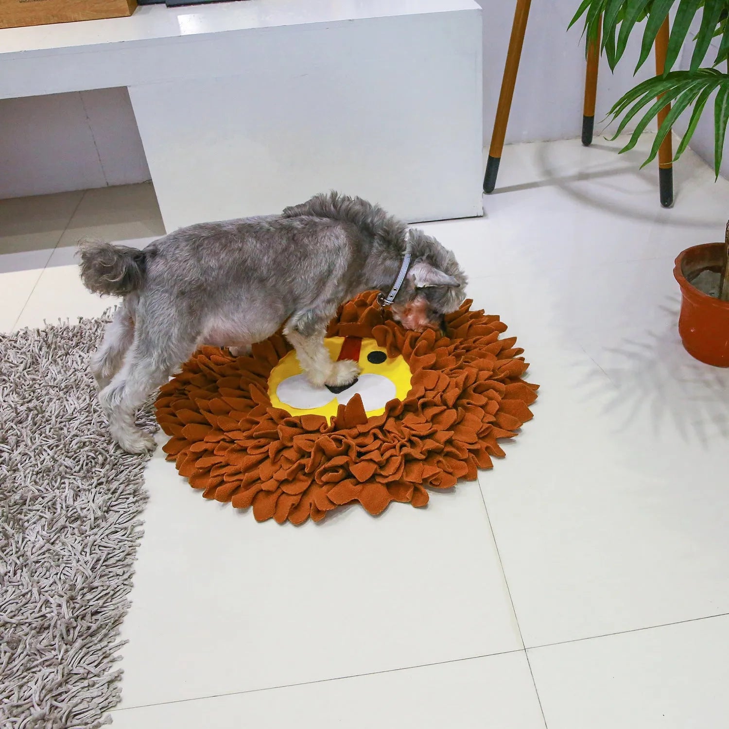 Brown lion-shaped pet sniffing pad with textured surface for hiding treats