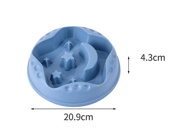 Large blue dog bowl with raised moon and star shapes inside as a slow feeder