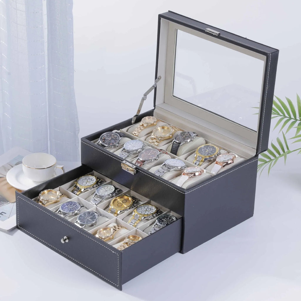 Grey high-grade leather watch storage box with a clear, dustproof lid on a table.