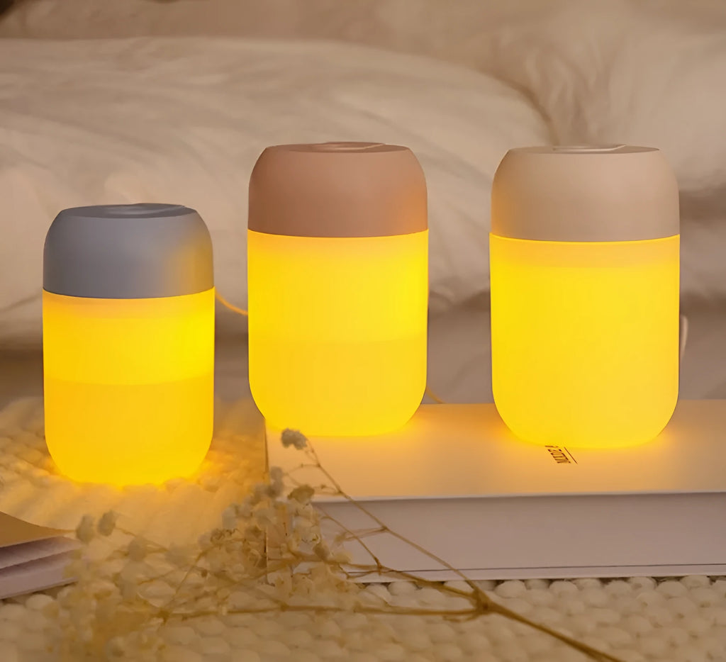 Small white cylindrical USB-powered humidifier with aromatherapy function