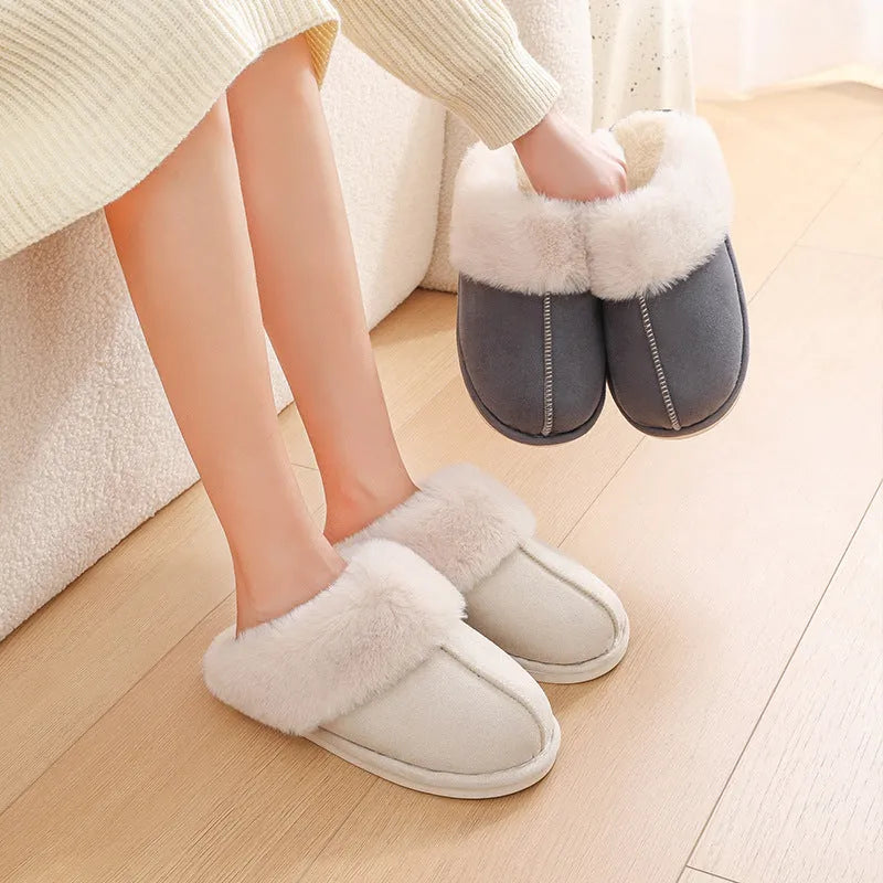 Women's brown plush indoor slippers with round toe, flat heel, and textured non-slip sole.