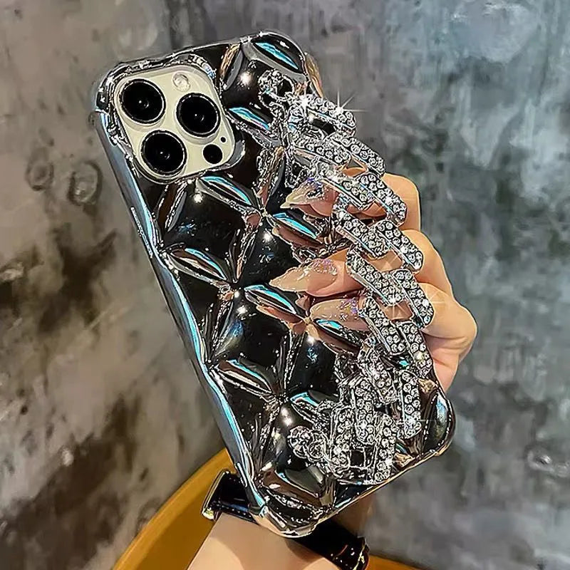 iPhone phone case with attached diamond bracelet chain accessory in gold or silver design