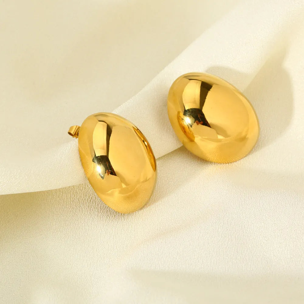 A pair of geometric stainless steel ear studs with a glazed electroplated finish in colour DFE139.