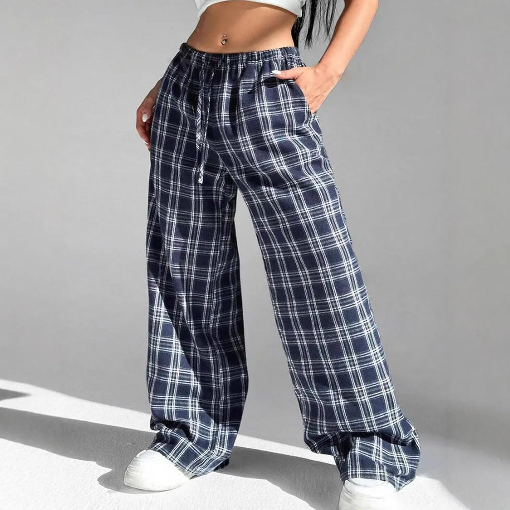 Women's loose-fit plaid trousers with drawstring waist and side pockets in blue or red