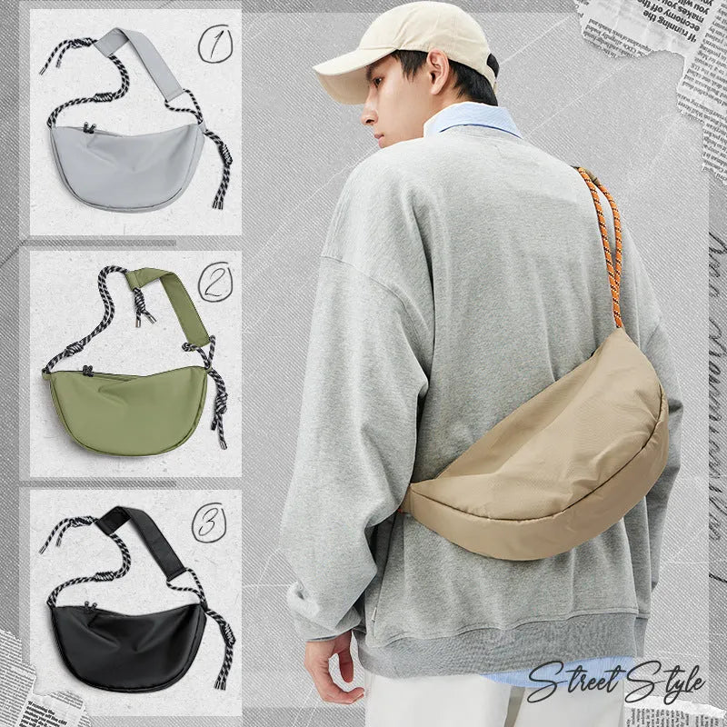 Men's large capacity commuter messenger bag in solid colour nylon with urban simplicity style