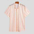 Pink men's short-sleeve cardigan shirt with a waffle-knit texture on a hanger.