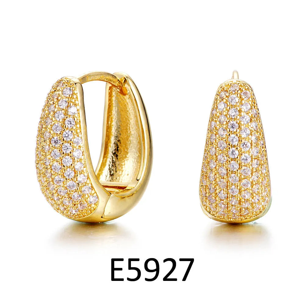 Brass gold plated copper clip earrings with heart shape and zircon gang drill details