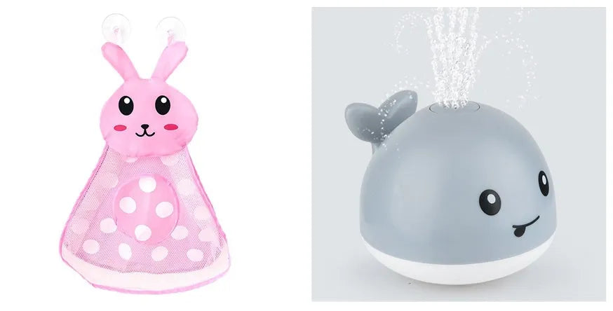 Electric whale bath toy with automatic water spray and flashing lights on a base