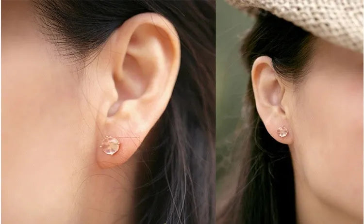 Women's rose gold Korean style drop shaped stud earrings with synthetic ross quartz crystal inlay
