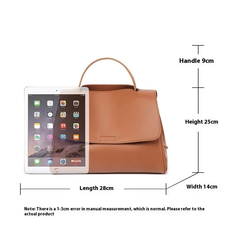Soft genuine leather women's shoulder messenger bag in horizontal square shape with sewing thread detail, black colour