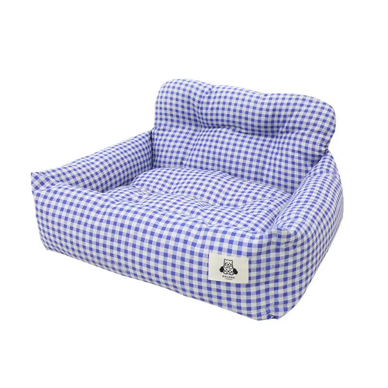 Grey and blue plaid stain-resistant cloth pet nest for car travel, shown in small and large sizes.