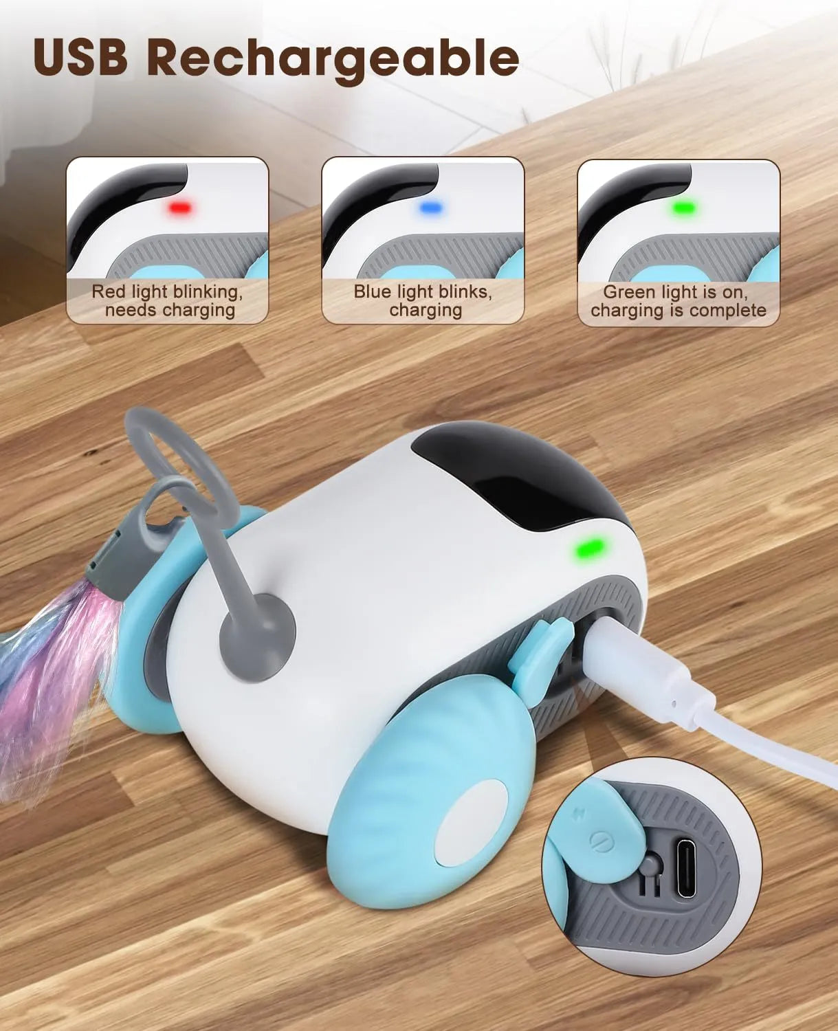 Blue remote-controlled cat toy car with feather attachment on hardwood floor
