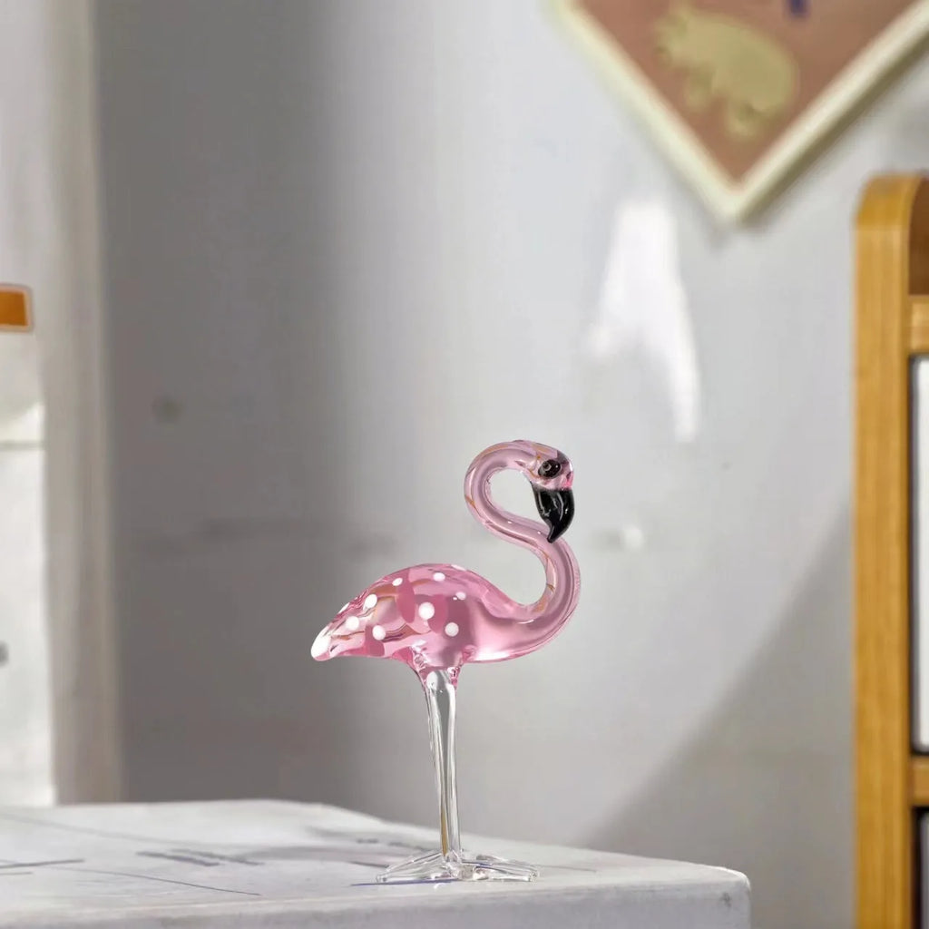 Pink crystal flamingo decorative animal figure on table with modern minimalist style