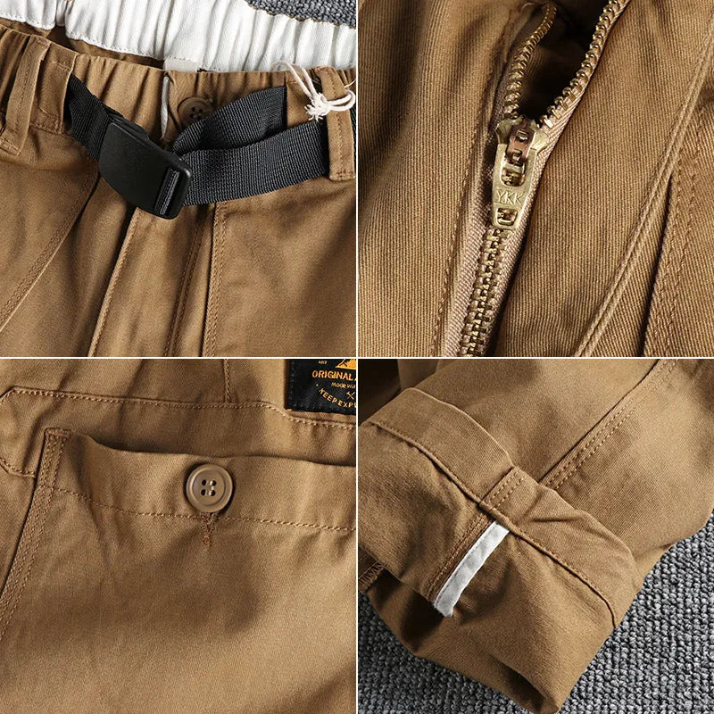 Men's khaki cotton work trousers with N I buckle belt showing three-dimensional cutting detail