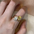 Geometric open ring with water drop double sheng stone centrepiece in copper construction