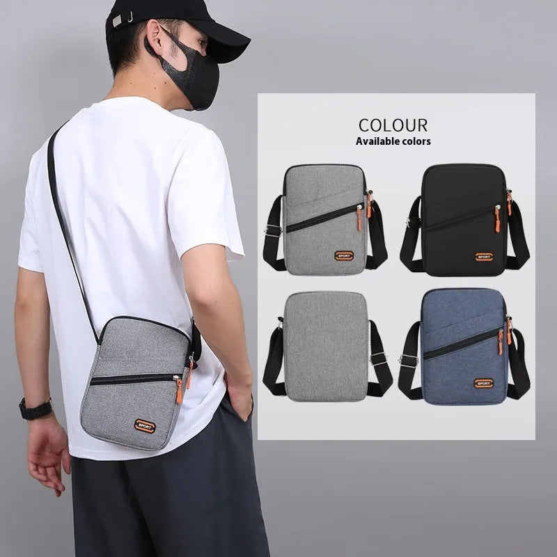 Ultra-light Oxford cloth crossbody commuter bag in black, navy blue, or silver grey with contrast colour detailing.