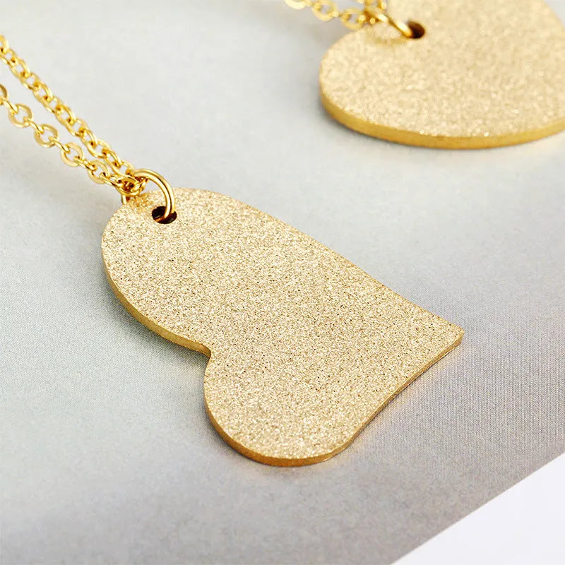 Women's titanium steel necklace with geometric heart pendant in colour KN25736-Z