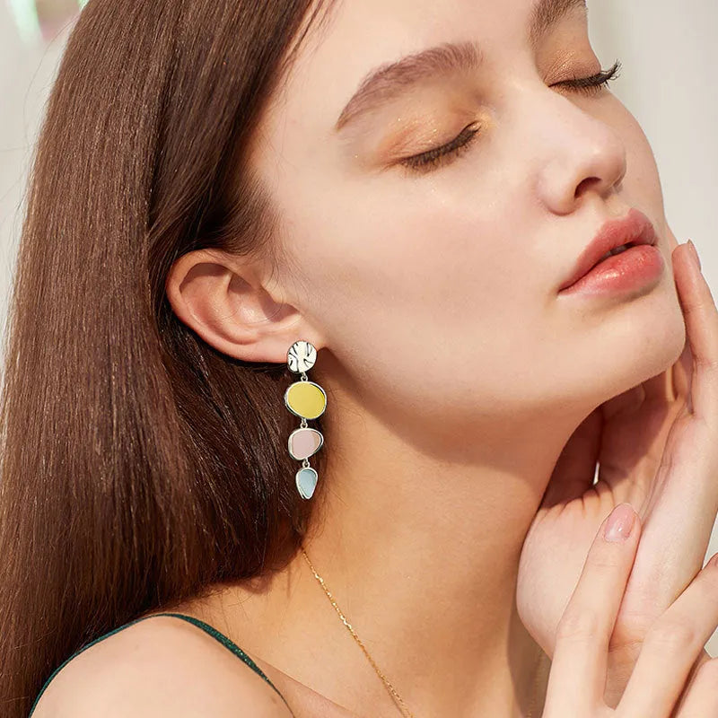 Alloy drop earrings with Morandi colours from oil drip treatment, showing simple vintage disc design.