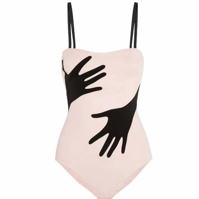 A women's one-piece bikini swimsuit with a gauze skirt, shown in a colour option.