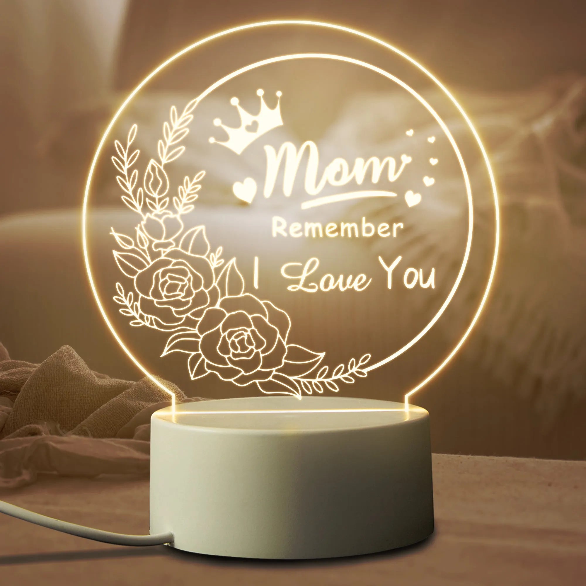Modern minimalist LED night light with acrylic shade on a white ABS base, powered by a USB cable.