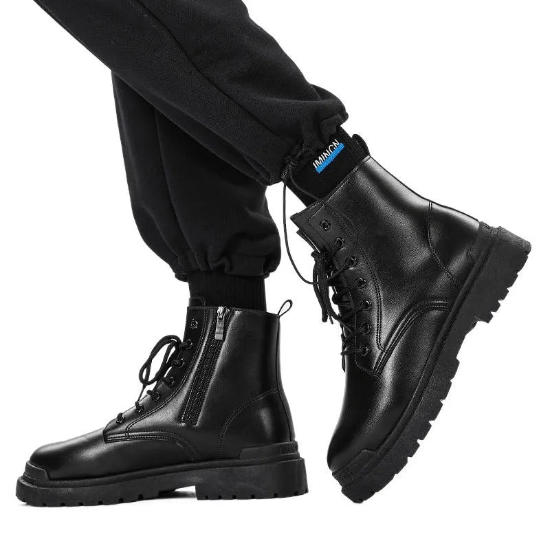 Men's black mid-top waterproof work boots with a flat rubber sole.