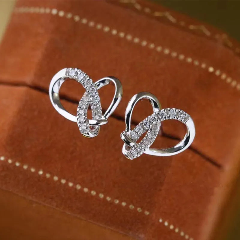 Simple copper winding triangle heart-shaped earrings with micro-inlaid zircon in white gold and rose gold colour options