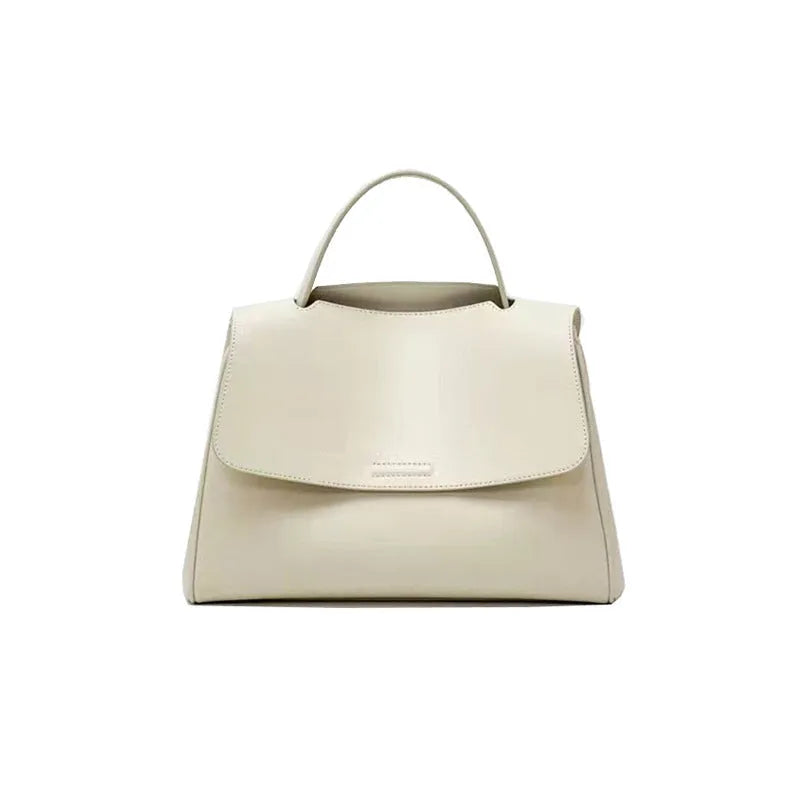 Soft genuine leather women's shoulder messenger bag in horizontal square shape with sewing thread detail, black colour