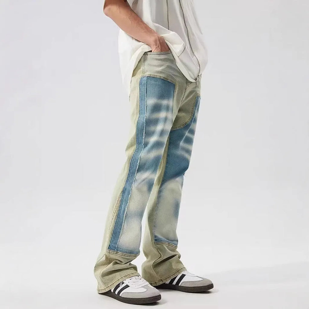 Yellow and blue retro patchwork splash-ink damaged design jeans with mid-waist fit and zip fly