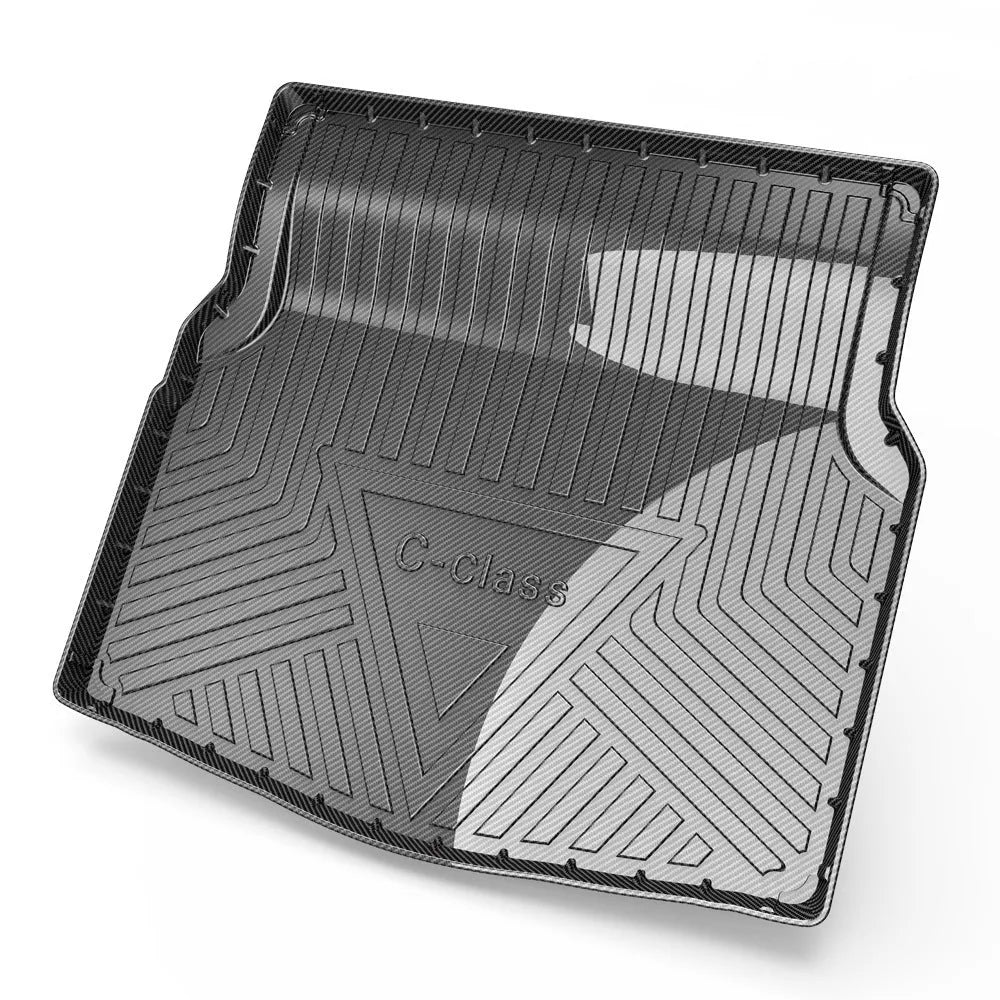 Black TPE car trunk pad with carbon fibre pattern installed in vehicle tailbox