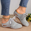 Women's summer wedge slippers with suede upper, lace-up design, and rubber sole in light grey.