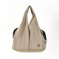 Apricot colour cloth pet carrier handbag with breathable mesh for a cat or small dog.