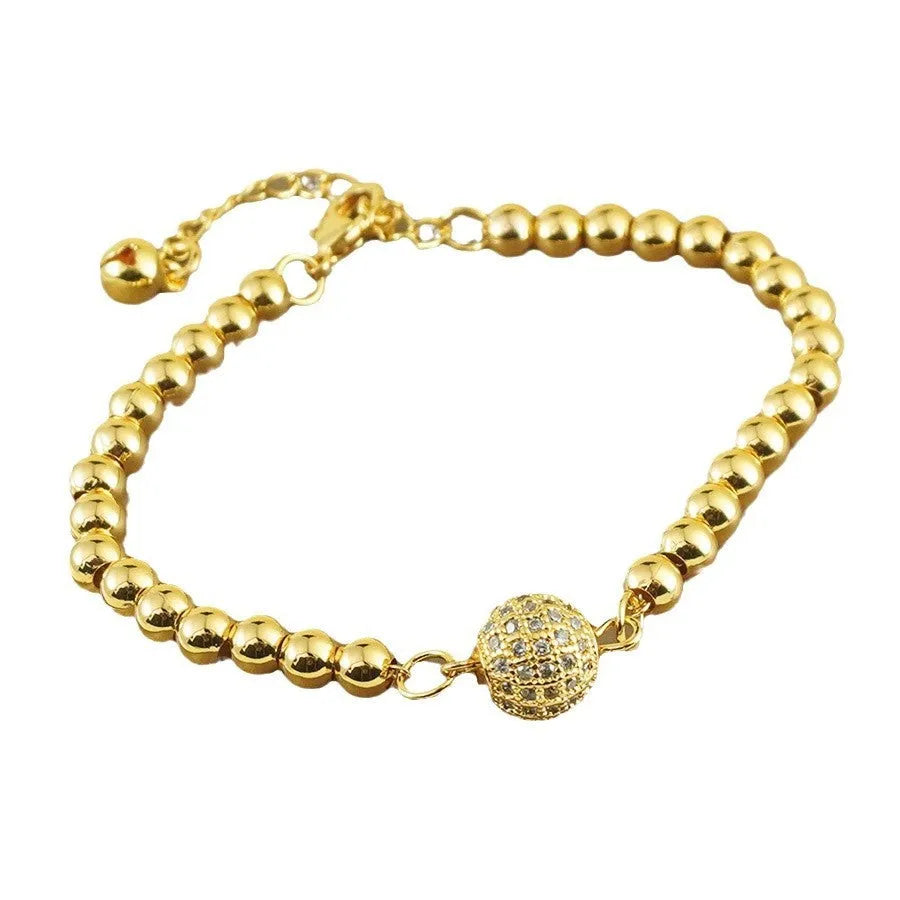 Women's heart-shaped copper bracelet with single ball zircon accents and electroplated finish