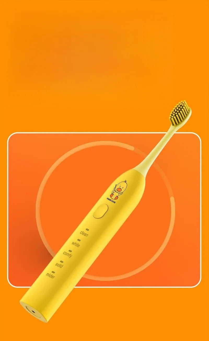 Yellow rechargeable electric toothbrush with small duck design, soft bristles, and a compact size.