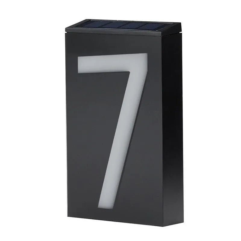 Solar powered house number light with LED illumination and wall-mounted outdoor design