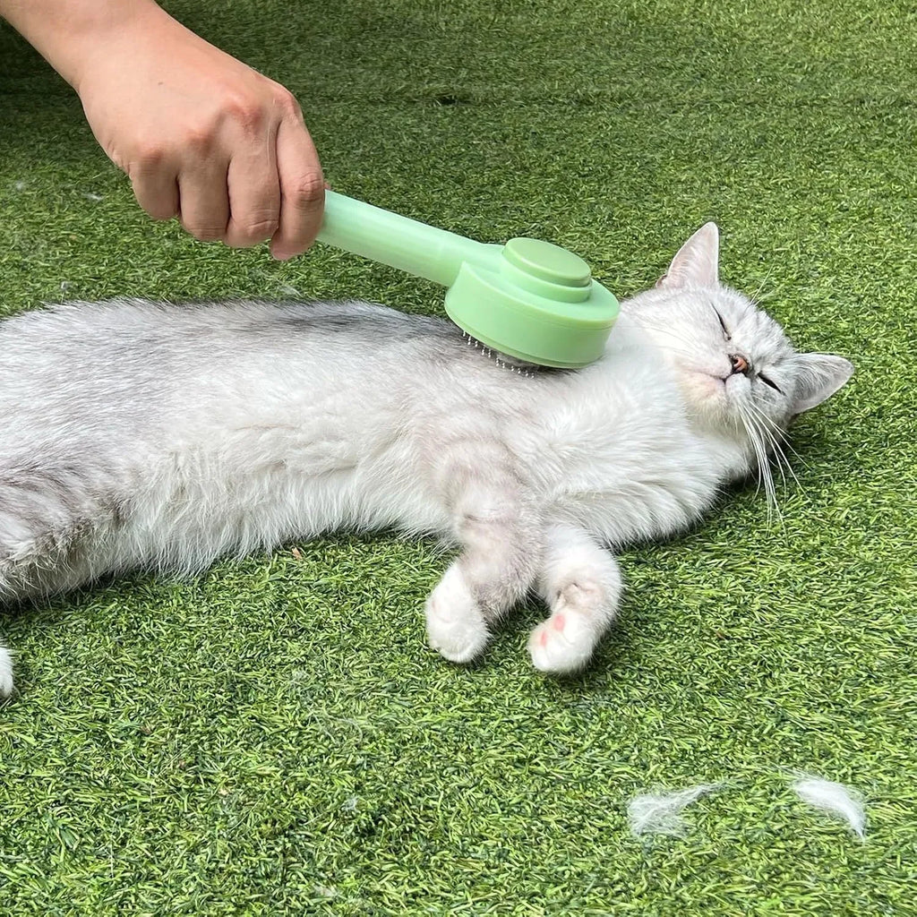 Green pet grooming brush with stainless steel teeth for deshedding cats and dogs