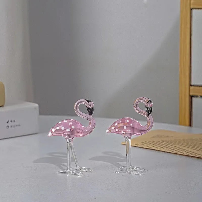 Pink crystal flamingo decorative animal figure on table with modern minimalist style