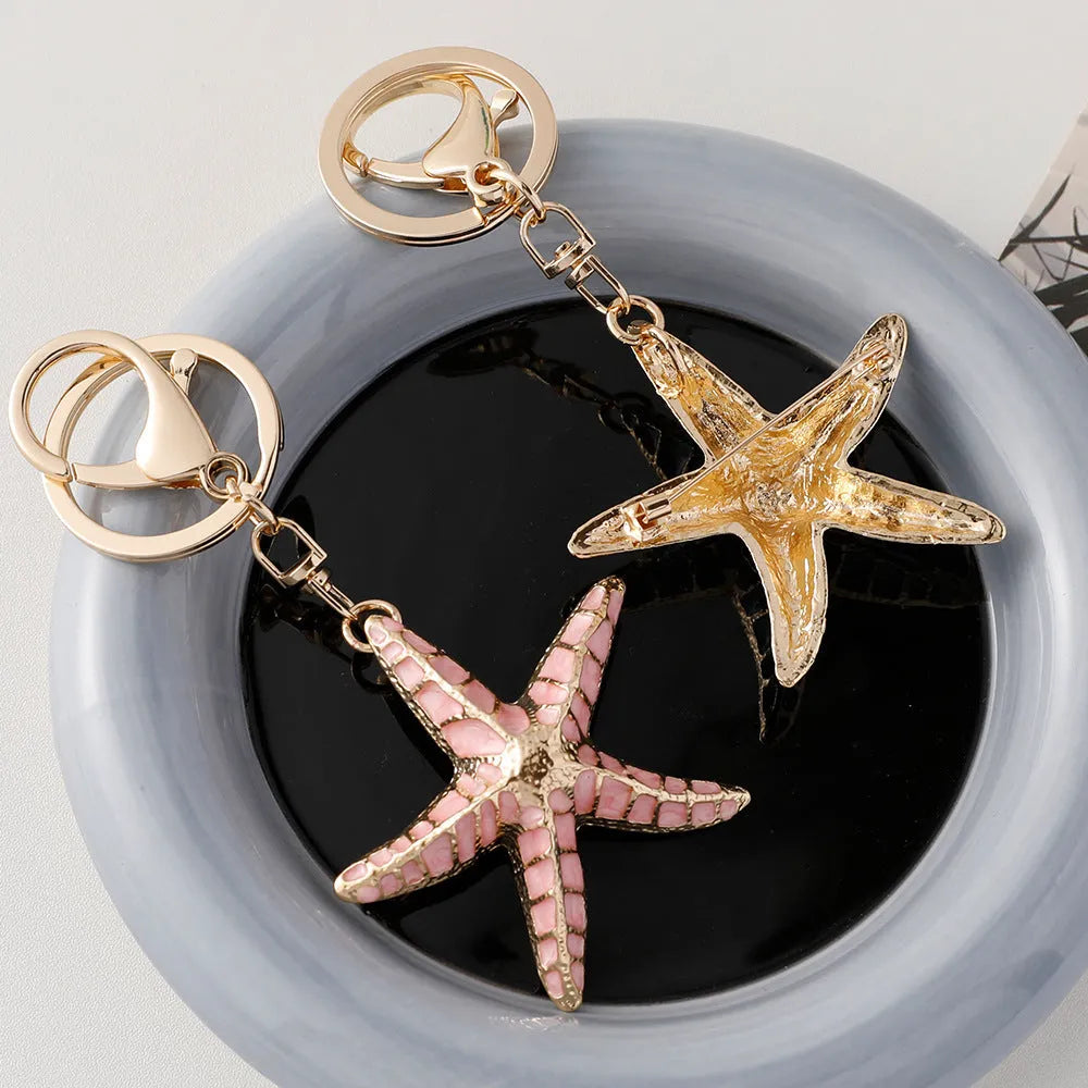 Ocean Series starfish shell keychain with electroplated finish in blue pink and purple colours