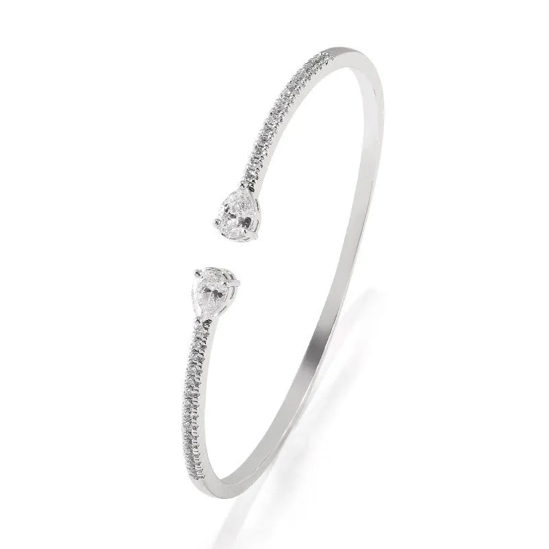 Personalised multi-zircon copper bracelet showing white and blue colour options with simple design