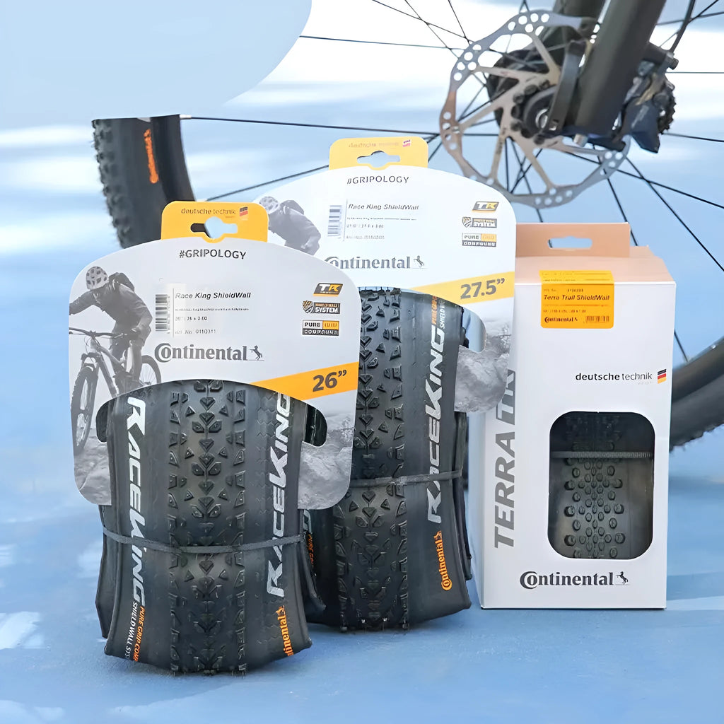 Mountain bike tyre showing yellow sidewall, available in multiple wheel sizes for off-road cycling.