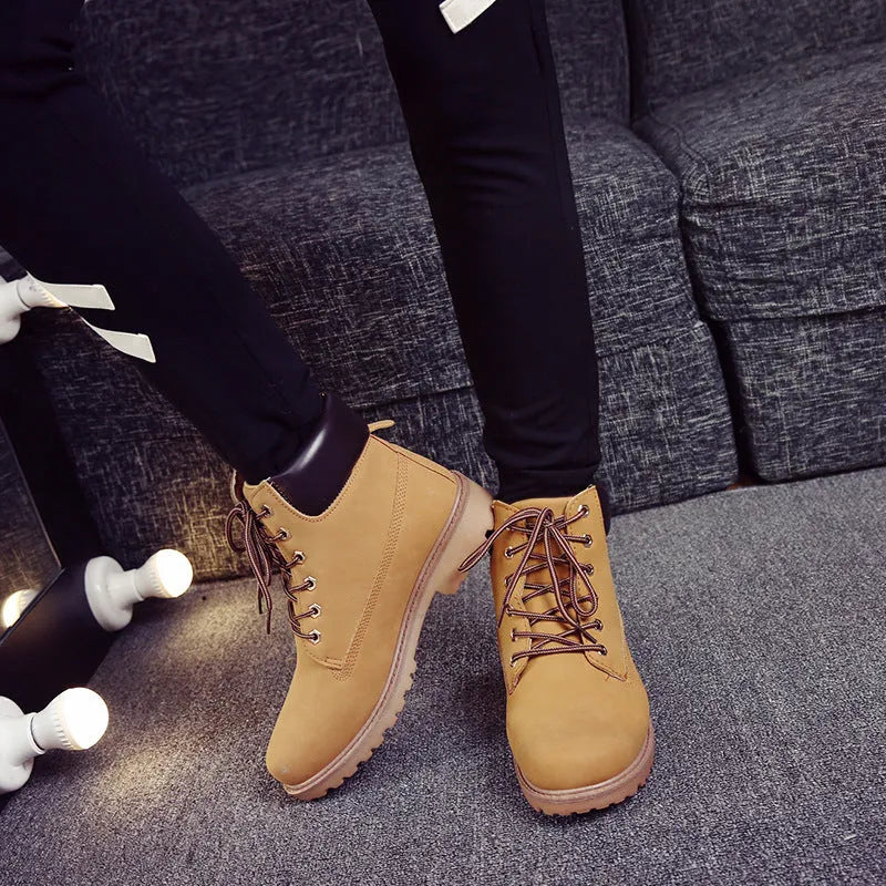 Pink Martin boots with velvet lining, flat bottom low heel, and front lace-up closure