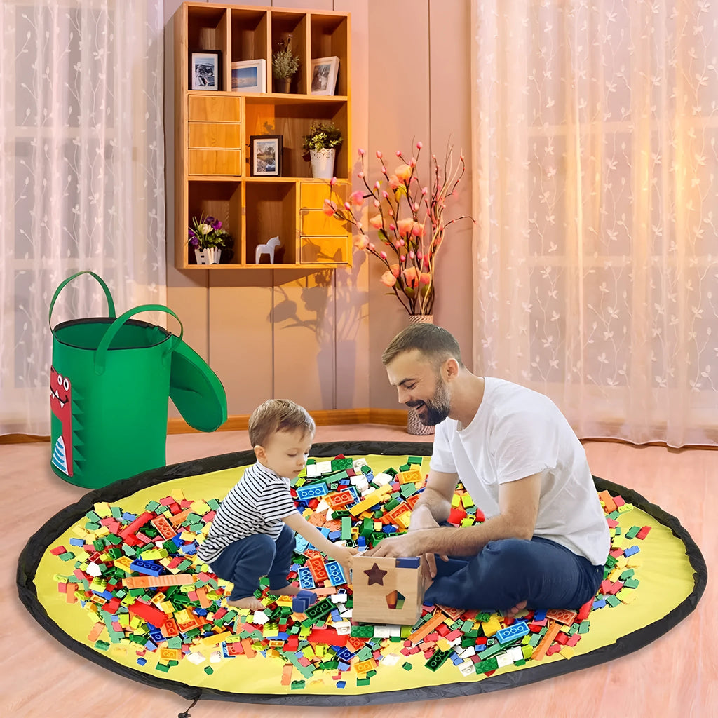 Green felt cube storage bag with pull rope closure lying flat as a play mat.