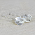 Silver women's earrings with glossy round retro bird and floral design in zinc alloy