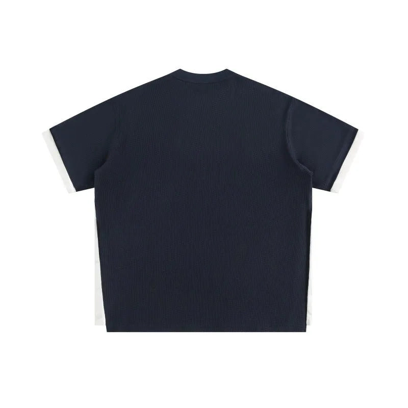 Retro alphabet embroidered loose waffle T-shirt in polyester fibre showing fake two-piece design