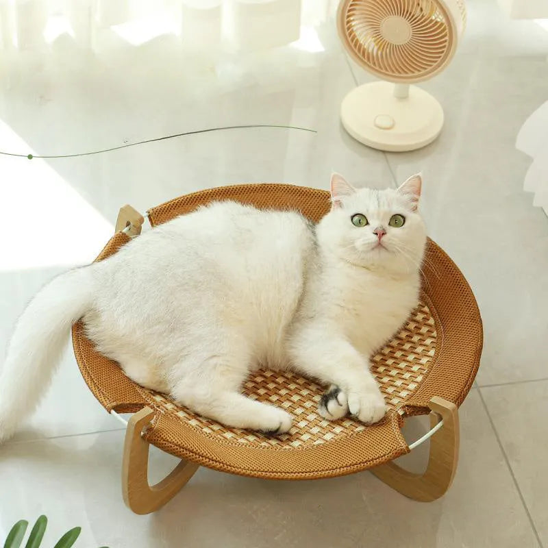 Brown woven rattan raised pet bed for cats and dogs, measuring 46cm square.
