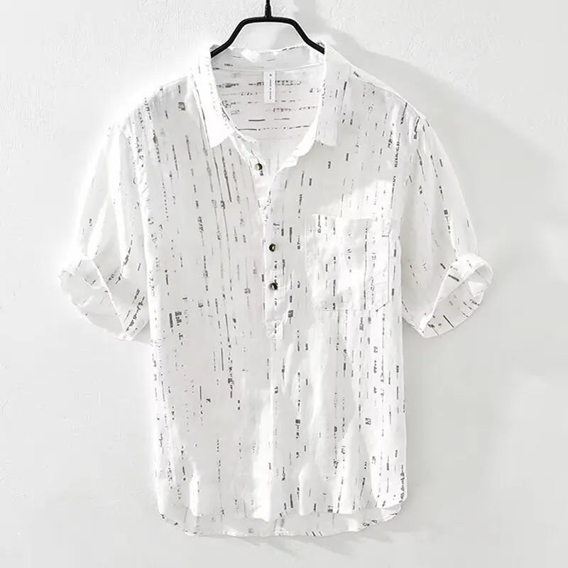 Men's loose fit short-sleeved polo shirt with lapel collar in black, laid flat.