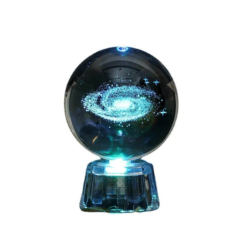 Transparent 6cm crystal ball ornament with internal laser carving and LED illumination on fixed base