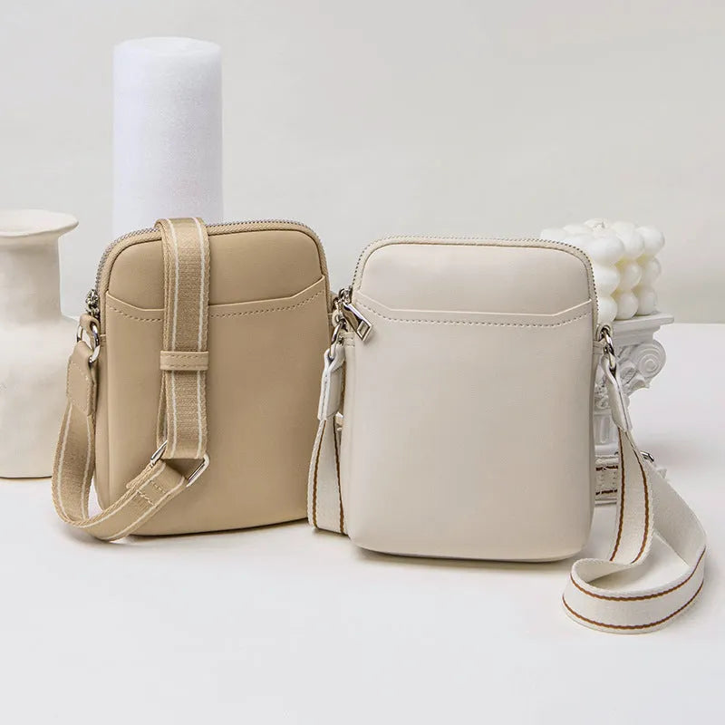 Solid colour small crossbody shoulder bag for women in beige, black, green, or khaki