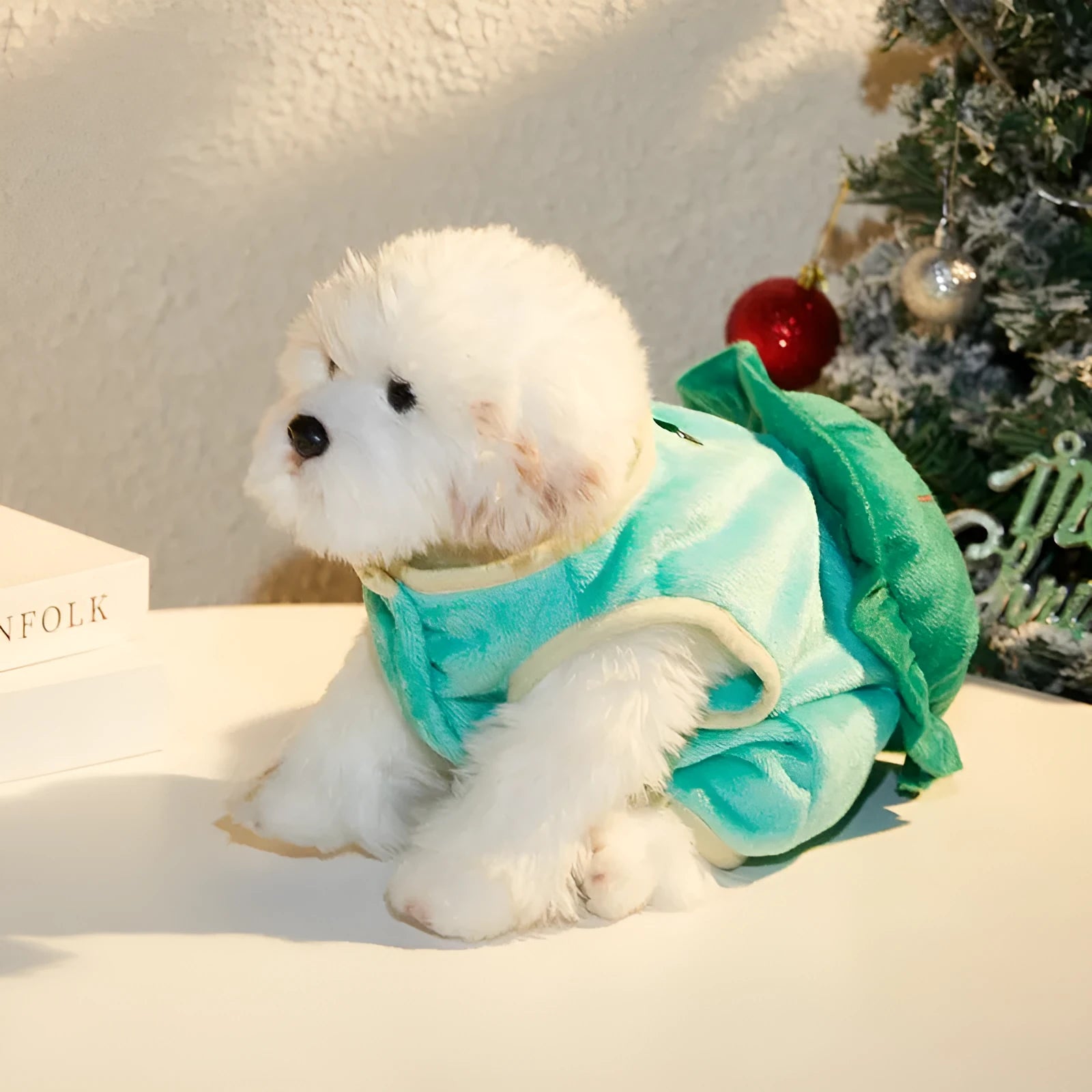 Green flannel pet clothing with cute turtle design on a light background, available in multiple sizes