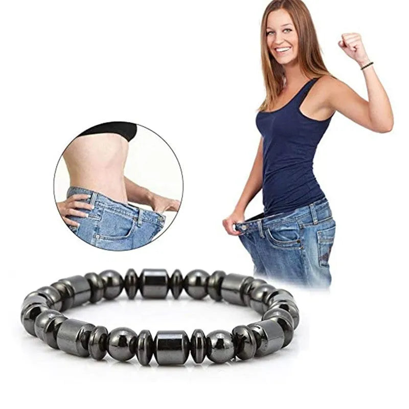 Black pentagram magnetic therapy bracelet with magnetite and hematite beads on wrist